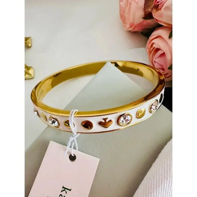    Kate Spade New York Armband Weiß Gold Strass & Symbole - Chic Schmuck