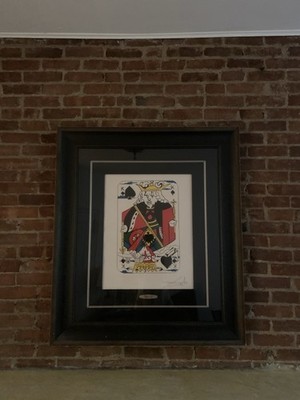 Oversized statement piece: Salvador Dali art framed in dark wood