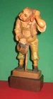 Small Carved Wooden Stature Tired Hiker