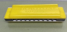 Vintage hard plastic Yellow Harmonica Harmonic Reed company phillidelphia PA