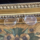 old pair of eyeglasses glasses circa 1900 gold nose clip