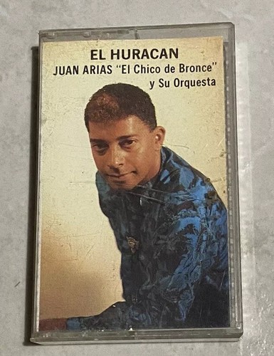 Juan Arias “El Chico De Bronce” Y Su Orquesta - El Huracan - Cassette