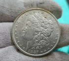 1887 O Morgan Silver Dollar New Orleans Mint BU AU