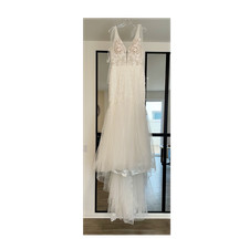Ivory Sleeveless V Neck Lace Beaded Tulle Fit And Flare Wedding Dress With Train