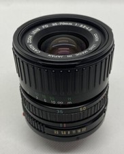   Excellent     Canon Zoom Lens FD 35-70mm 1:3.5-4.5  56  