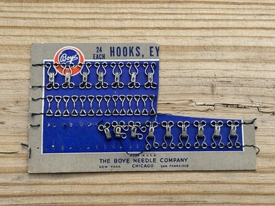 vintage Boye Needle Company hooks and eyes card featuring metal fasteners