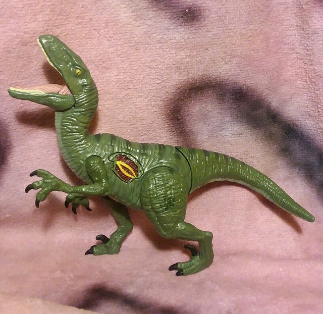 battle damage velociraptor