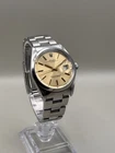 Rolex Oyster Perpetual Date 15000 Champagne Sunburst Dial 34mm Acrylic Cal. 3035