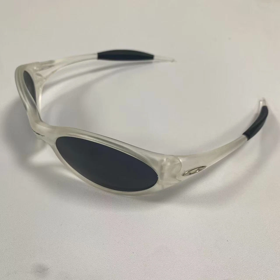 Gafas de sol Oakley de colección chaqueta recta marco transparente lentes negras Foto 2 de 4