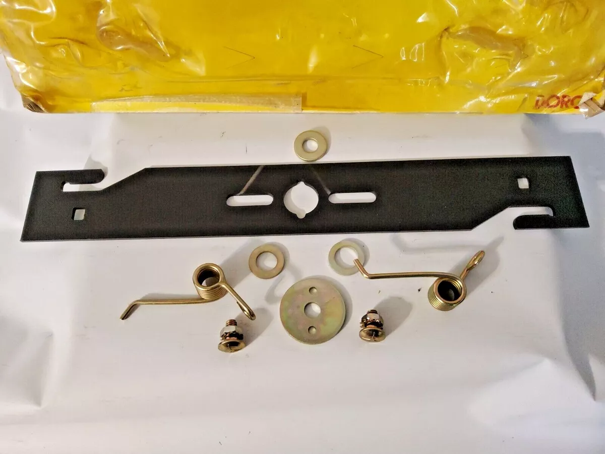 Dethatching blade outlet