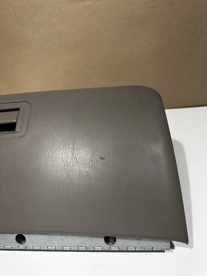 Guantera de excursión Super Duty F250 F350 F450 1999-2007 bronceada oscura fabricante original Foto 2 de 4