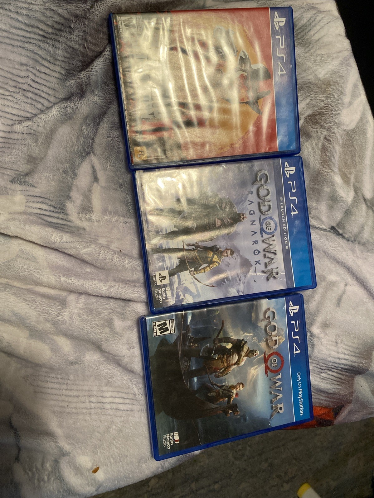 PS4 Slim & PS4. 2 Controllers ( 1 Wireless),2 HDMI CORDS, 2 Power Cords, 3 Games