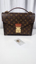 Louis Vuitton Monceau 28. Original shoulder strap and key included.