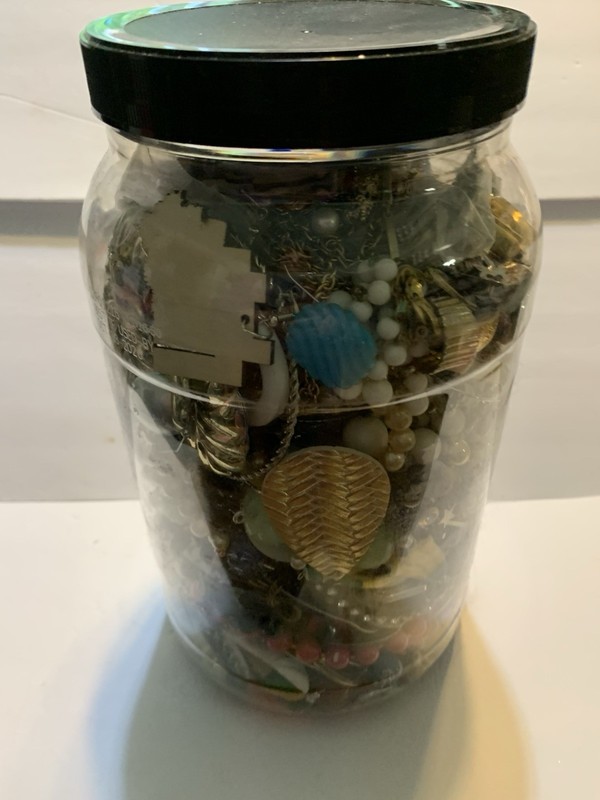 #196. Plastic Container Of Strictly Junk Jewelry For Crafting.