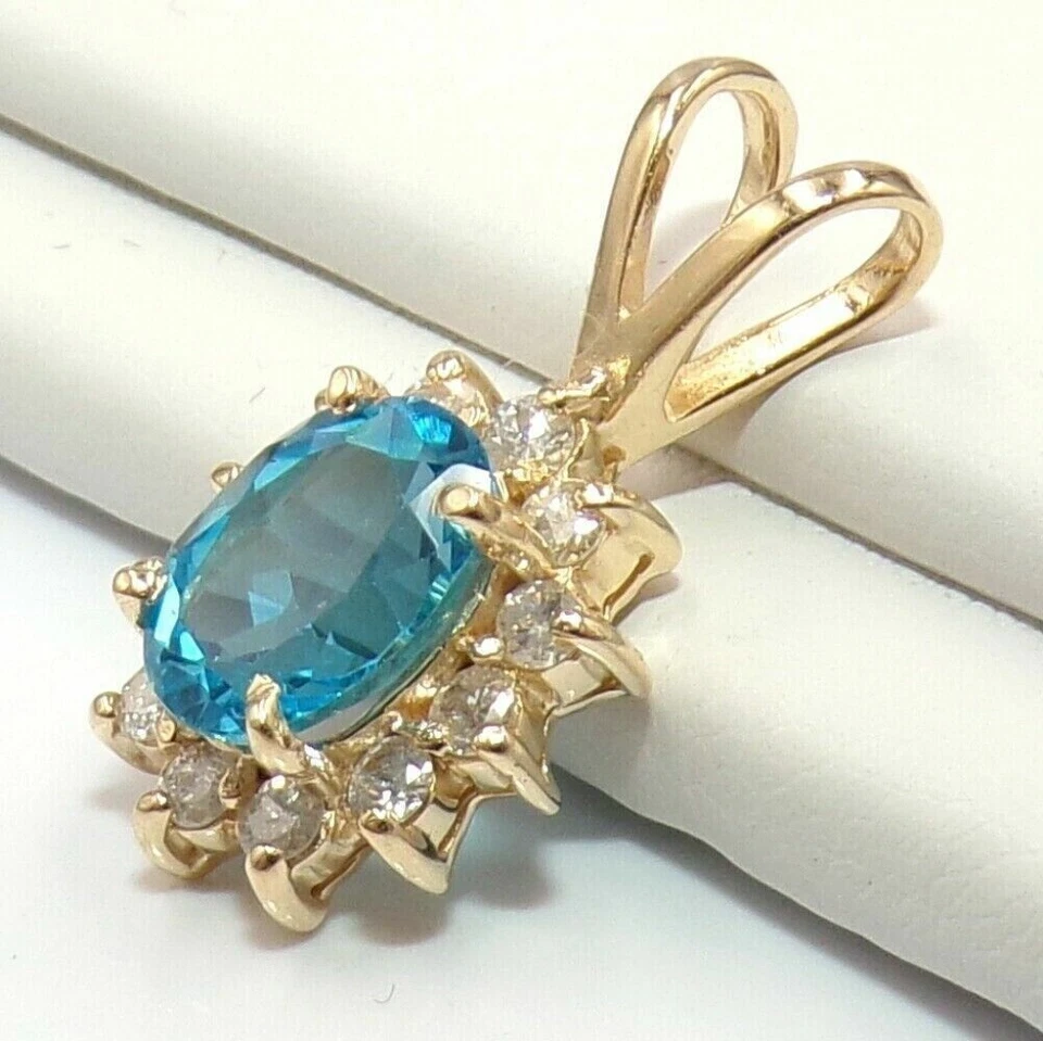 2.0Ct Oval Cut CREATED Blue Topaz Women's Pendant 14K Yellow Gold Plated Silver - Image 3 of 4