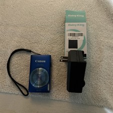 Canon PowerShot ELPH 115 IS / IXUS 1:3.2-6.9 Digital Camera - Blue and charger
