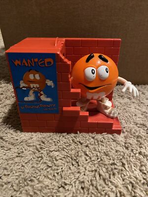 M&M Orange Dispenser ''Wanted - Feeding Frenzy Has Begun'' circa 1999 OO