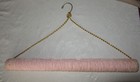 FABRIC COVERED ROLLED HANGER W/GOLD CORD, USED FOR HANGING FURS