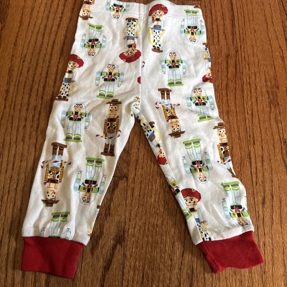 Рождественский детский пижамный набор EUC Disney Toy Story Buzz Woody Jessie Nutcracker 18 М - Изображение 2 из 4