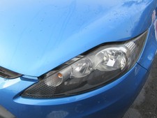 Orig. Scheinwerfer links Ford Fiesta 1.25 JA8