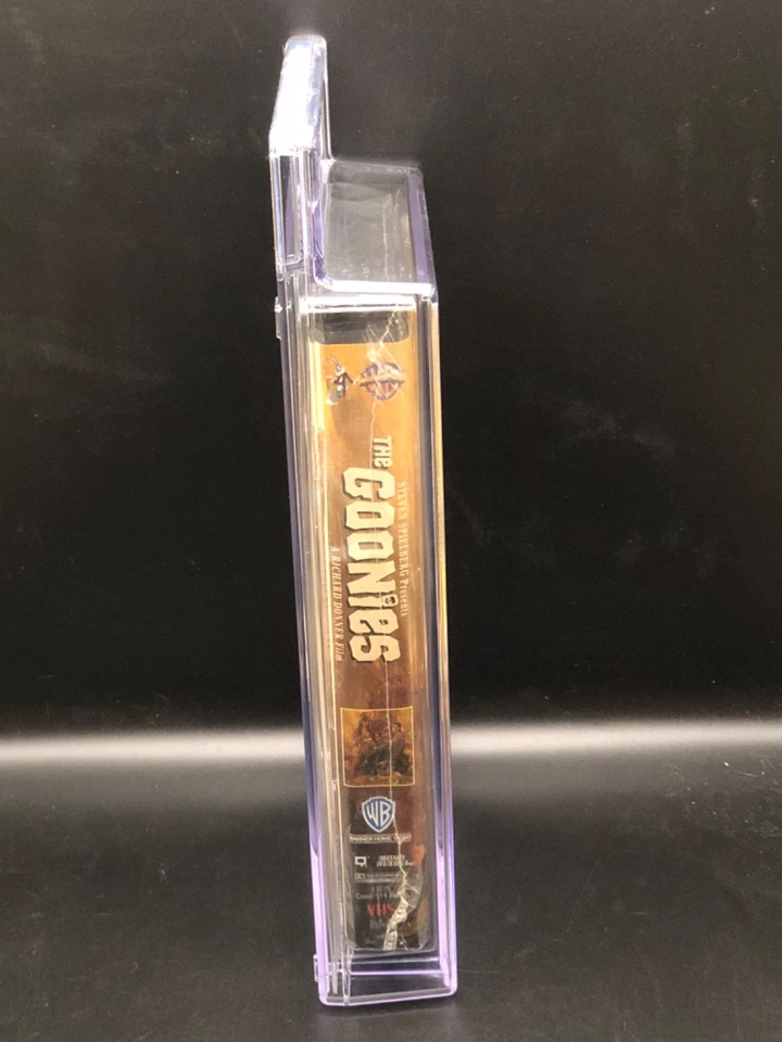 The Goonies (1985) - 1994 VHS - CGC 9.4 - SEALED - Black Clamshell - Watermarked - Image 4 of 4