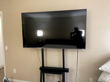 Hisense 65" ULED 4K Smart Fire TV 2024 Model with Heavy-Duty Rolling