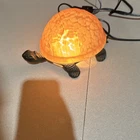 Vintage Tiffany-style amber art glass turtle accent lamp.