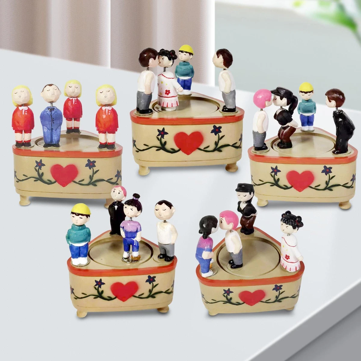 Kissing doll hotsell music box