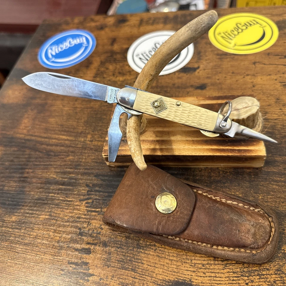 Cuchillo Camillus USA CUB SCOUT BSA Boy Scouts of America y funda de cuero Foto 2 de 4