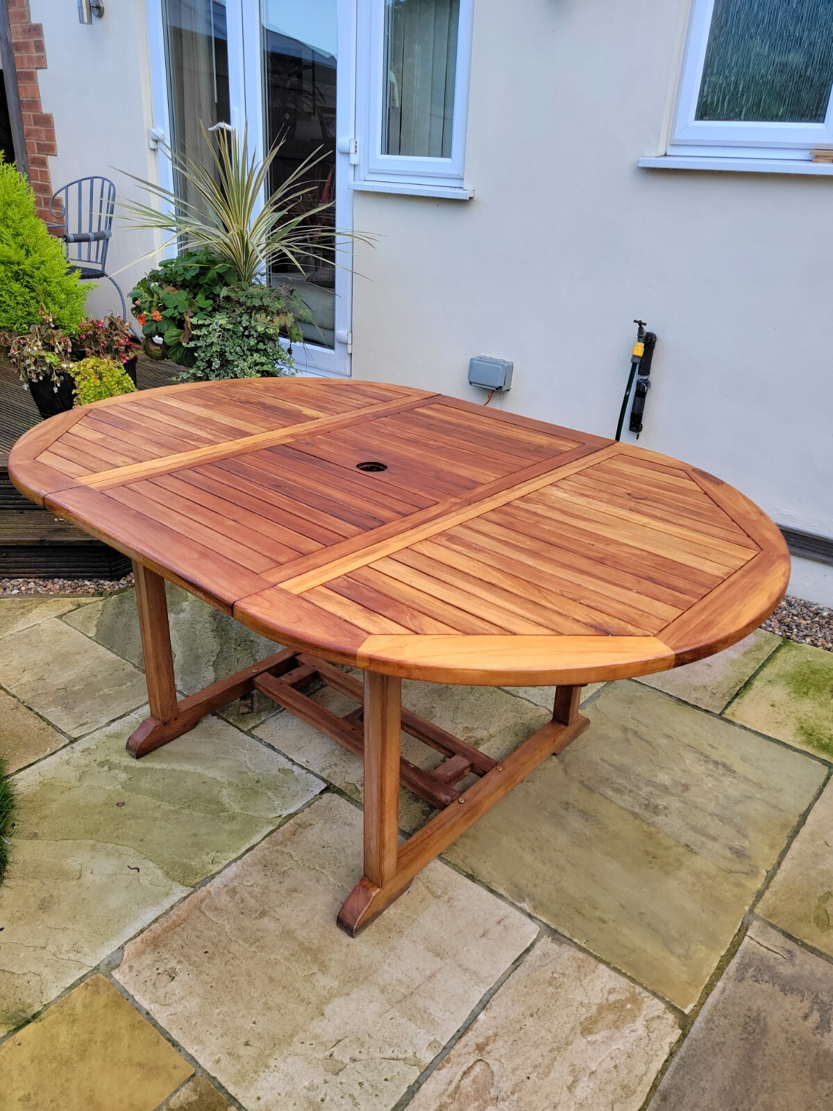 Teak extendable used good quality garden patio table in good condition