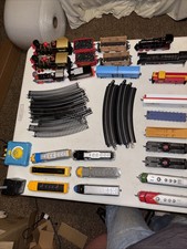 Large train lot, 13 engines 12 train cars  many track sets, 1 Backmann Control