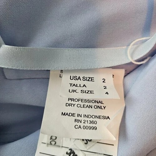 One-piece pantsuit, one shoulder style. Light blue, only been worn once! - Picture 3 of 3