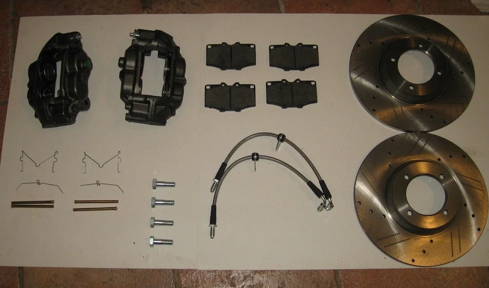 Nuevo kit de frenos grandes de rendimiento pinzas rotores mangueras etc. Triumph TR6 TR250 TR4A Foto 2 de 2