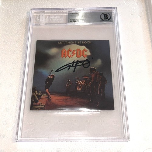 ANGUS YOUNG signed autographed ACDC LET THERE BE ROCK CD BOOK BECKETT ...