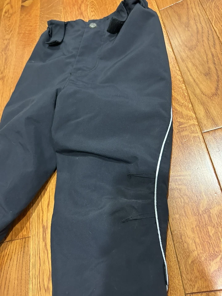 Pantalones de esquí/nieve MOLO para niños y niñas negros con estrellas blancas y forro polar talla 10 Foto 4 de 4