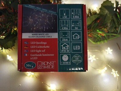 Konstsmide Tropfenlichterkette 50 warmweiße LED's mit silberf. Draht 9,90 lg.