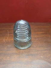vintage glass insulator, specifically a CD-143 "Canadian Pacific" model