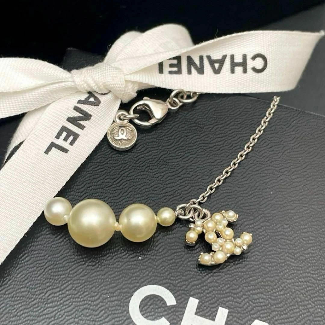 Bracciale CHANEL Coco Mark 14P ottime condizioni perle finte cocco