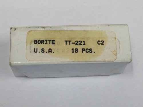 White rectangular box labeled “BORITE TT-221 C2 U.S.A. 10 PCS” with black text on a wooden surface.