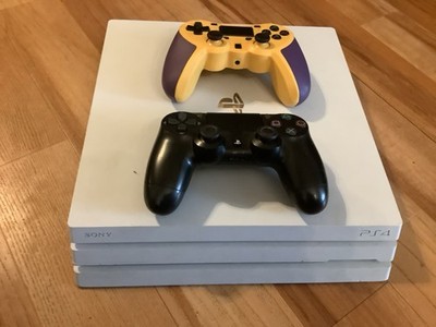 Sony PS4 Pro White Console 1tb (includes Two Controllers and all needed cords) 