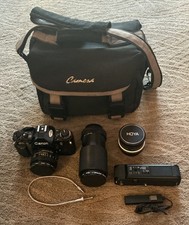 Canon A1 Black Vintage Film Camera w/3 Lenses, Winder, Soft Case Untested