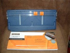 BRAND NEW FISKARS 12" PAPER TRIMMER WITH 3 HOLE PUNCH PRECISELY TRIMS PUNCHES