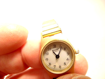 pre-owned Sharp Quartz gold colored ladies wrist watch