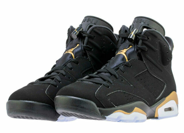 black and gold jordan 6's