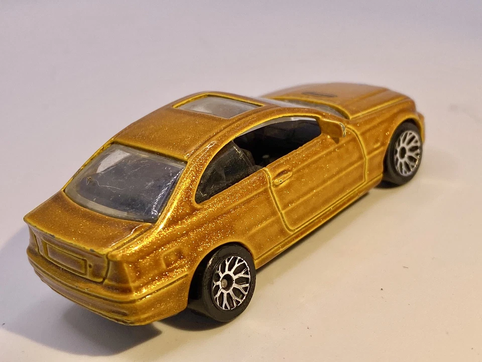 Matchbox🔥1999 BMW Serie 3 Cupé Dorado -1/64- Foto 4 de 4