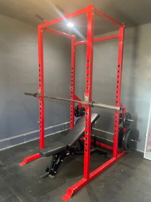Gym set up: Power rack, barbell, adjustable bench, 440 pounds in weight plates