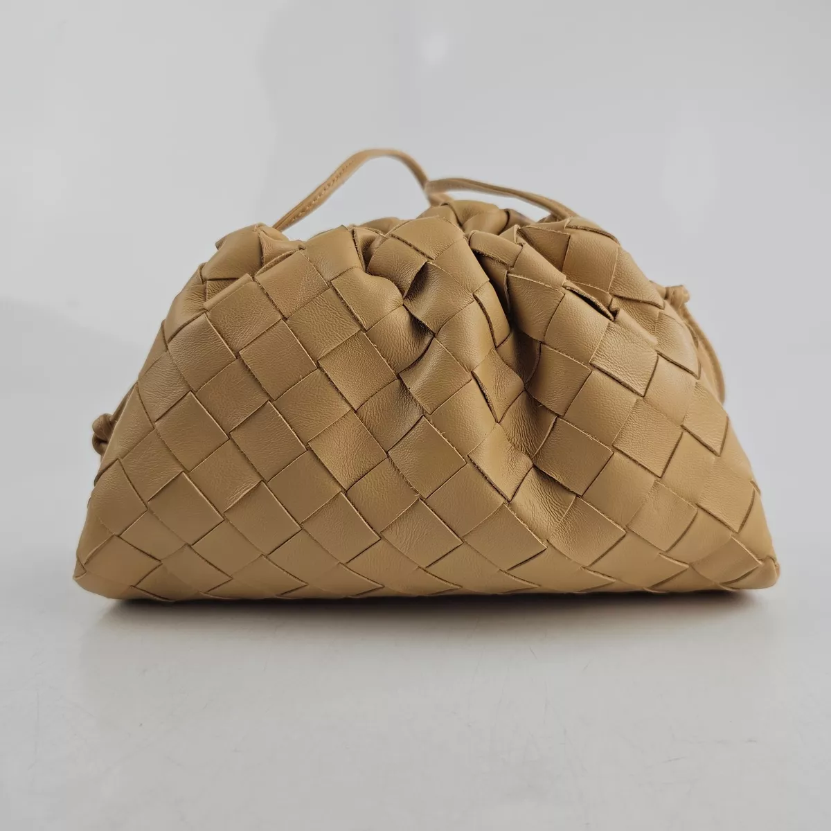 Pouch Intrecciato Leather Clutch in Beige - Bottega Veneta