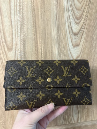 AuthenticLouis Vuitton Monogram Porte Tresor International fold wallet