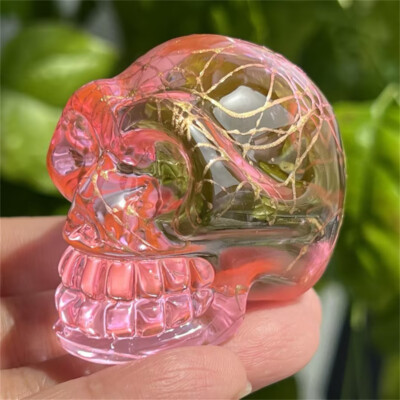 2'' titanium Pink aura smelting quartz skull crystal hand Carved Figurines 1pc