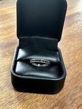 Sterling Silver And Garnet Round Band Ring